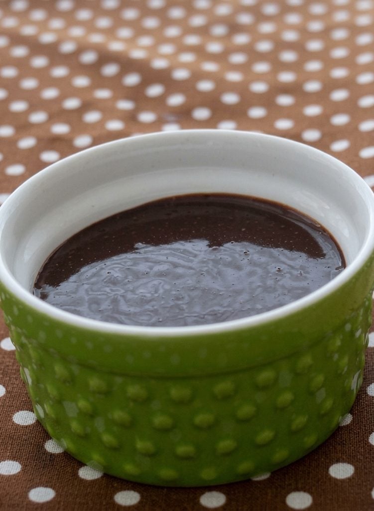 chocolate ganache in a small green bowl