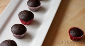 mini chocolate cupcakes in a white rectangular plate