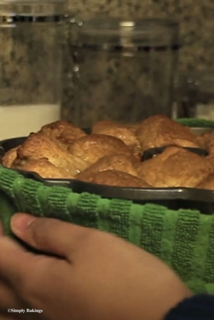 Layers of Monkey Bread in a Bundt pan freshly baked