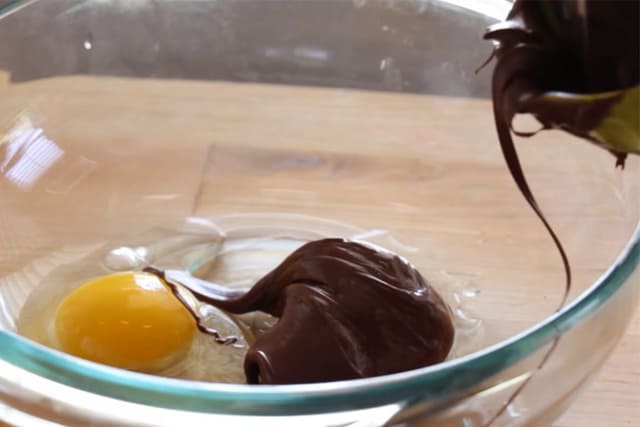 mixing egg and Nutella in a bowl