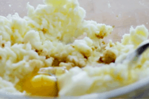 mixture of sugar, egg, vanilla, and butter for easy sugar cookie recipe