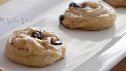 chocolate chip cream cheese cookies on a white plate