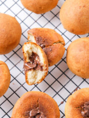 freshly baked chocolate filled bread on a cooling rack