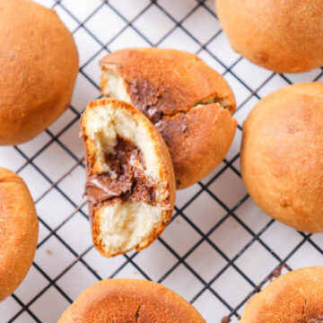 freshly baked chocolate filled bread on a cooling rack