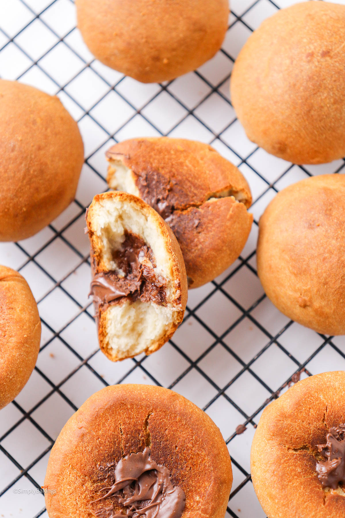 freshly baked chocolate filled bread on a cooling rack