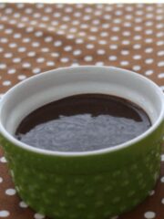 chocolate ganache in a small green bowl