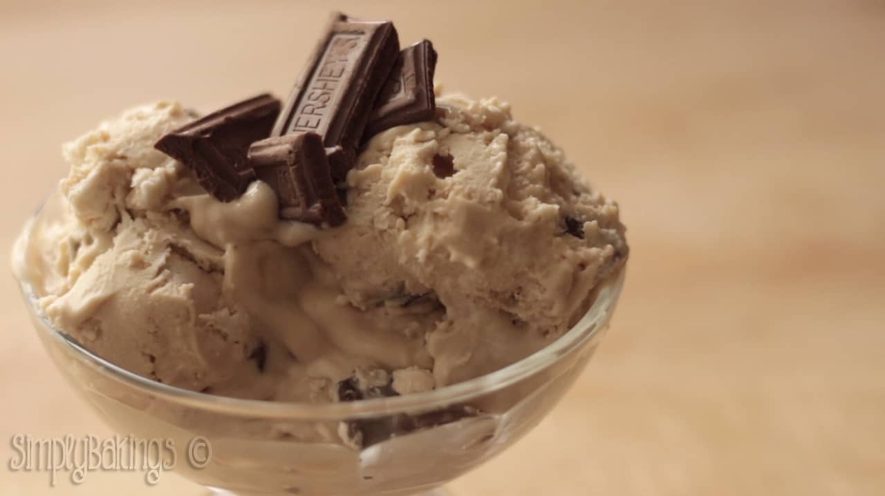 cookie butter ice cream in a glass with chocolate chunks