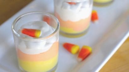 candy corn mousse in two small glasses
