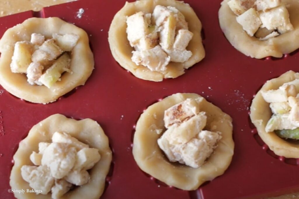 Apple filling added to each pie dough