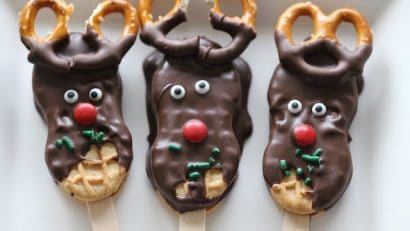 3 pieces of Reindeer Cookies on a white plate