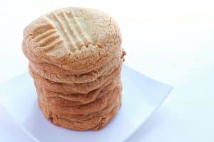 stack of peanut Butter cookies on a white plate