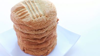 stack of peanut Butter cookies on a white plate