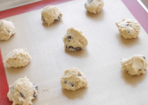 rootbeer cookie dough lined on a baking mat