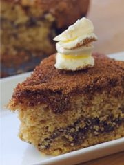 Coffee cake slice on a white plate