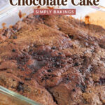 Chocolate Cake in a glass pan on a brown table