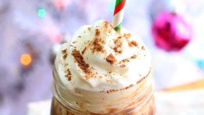 chocolate drink with whipped cream and cinnamon powder