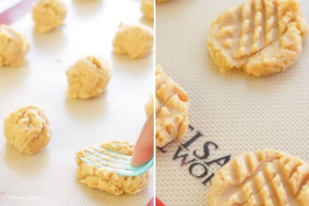 Cookie dough balls pressed down on the tray