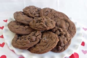 salted caramel chocolate cookies on a white plate