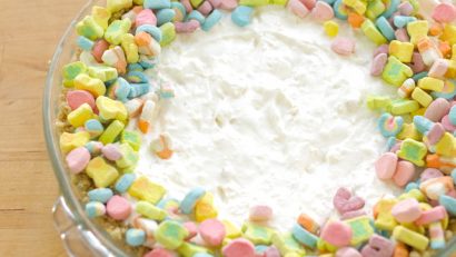 A plate of yummy rainbow cake with marshmallows