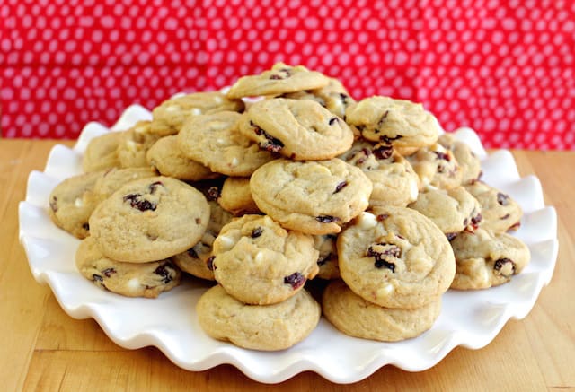 white chocolate cranberry cookies on a white plate
