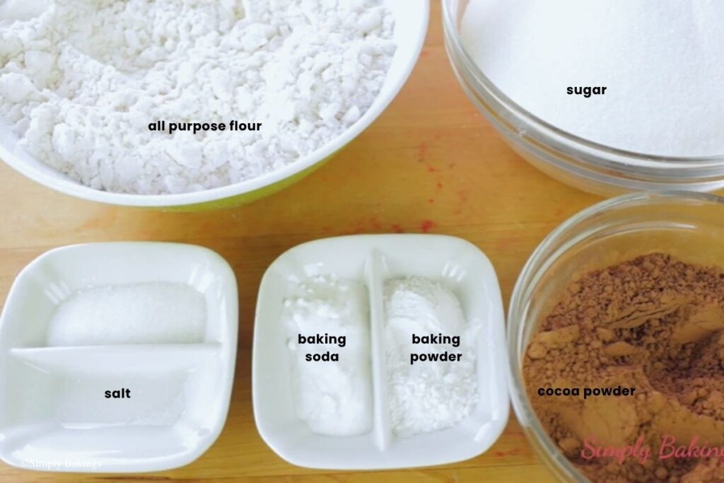 All ingredients for homemade cake mix in bowls