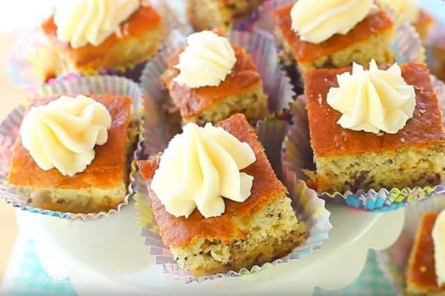 banana cake slices topped with whipped cream