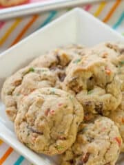 fruity pebble cookies on a white plate