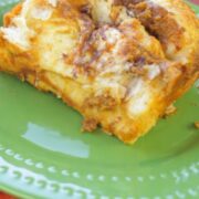 A green plate with a slice of Pumpkin Cinnamon Pull-Apart Bread