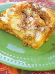 A green plate with a slice of Pumpkin Cinnamon Pull-Apart Bread