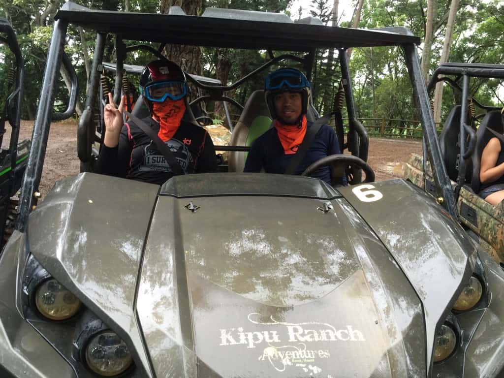 man and woman in a jeep