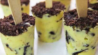Oreo popsicles on white plate