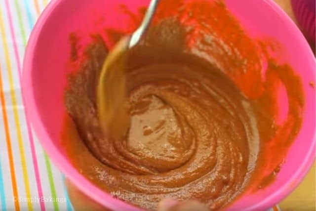 mixing the peanut butter in a bowl