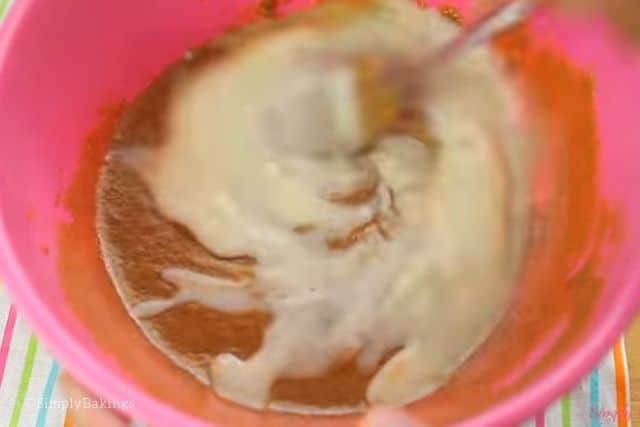 adding non-dairy milk to the peanut butter mixture