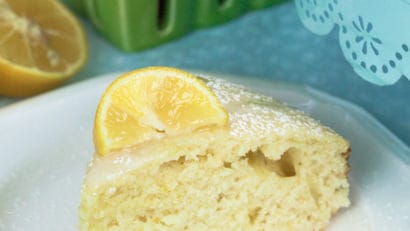 a slice of lemon cake glazed with lemon