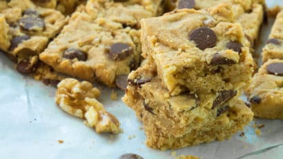 slices of vegan blondies on a parchment paper