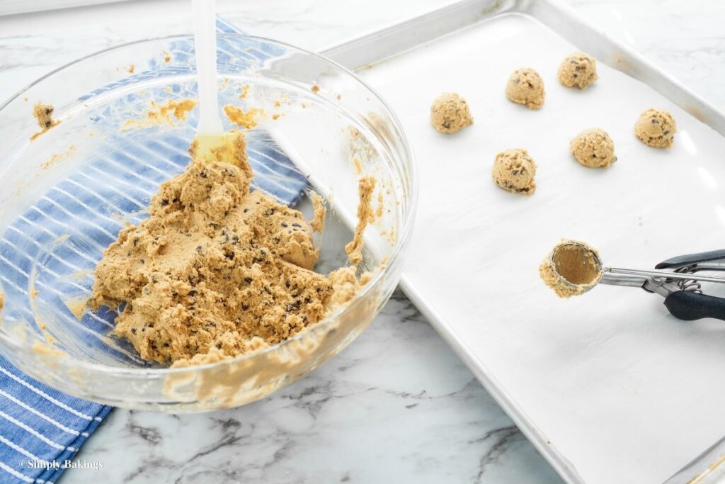 Making small pieces of dough with scooper