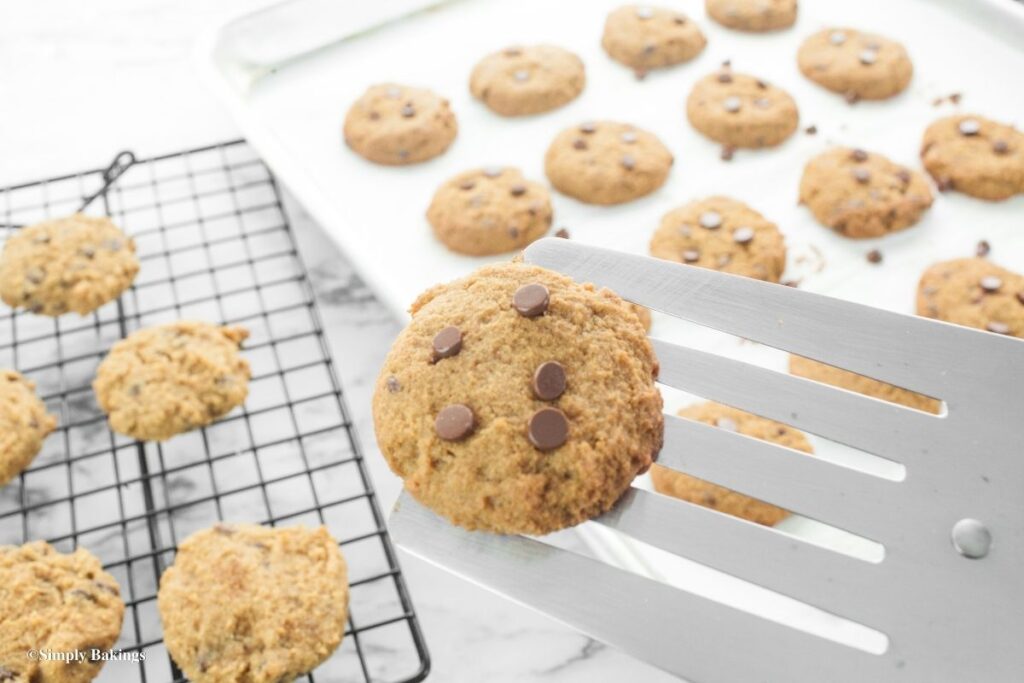 Freshly baked cookies transferred to cooling rack