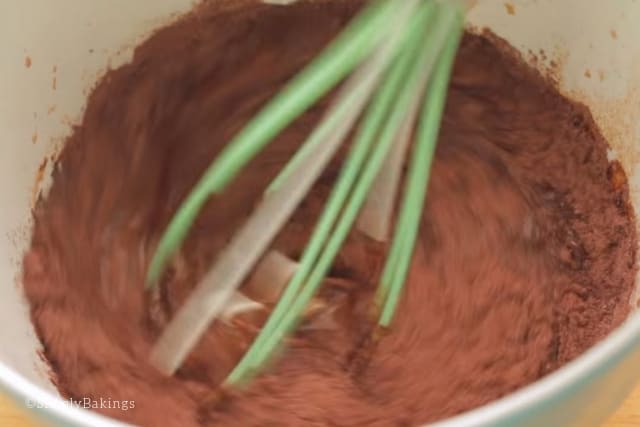 mixing the dry ingredients of rocky road popsicle recipe