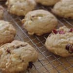 sweet and salty cranberry chip cookies in a cooling rack