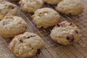sweet and salty cranberry chip cookies in a cooling rack