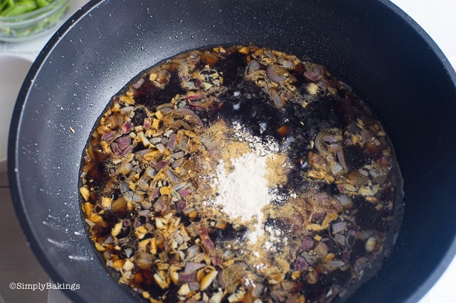adding msg-free seasoning for the pancit bihon recipe