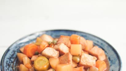 delicious and nutritious vegan chicken afritada in a blue plate