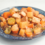 a plate of saucy filipino vegan afritada