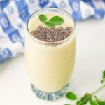 a glass of moringa smoothie with chia seeds toppings