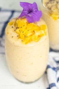 langka smoothie in a glass with edible flower
