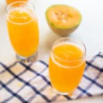 fresh cantaloupe juice in 2 glasses