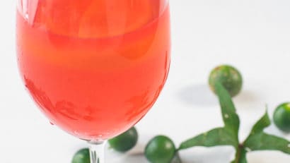 delicious kamote leaves juice in a glass with lemon slice