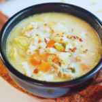 tasty filipino sopas on a black bowl