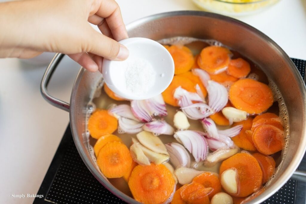 adding salt to the atsara mixture