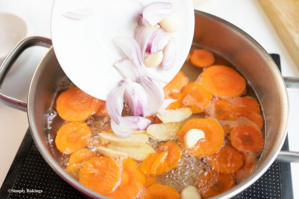 adding ingredients to mixture in pan
